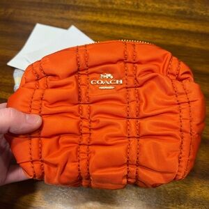Coach Orange Quilted Cosmetic Pouch